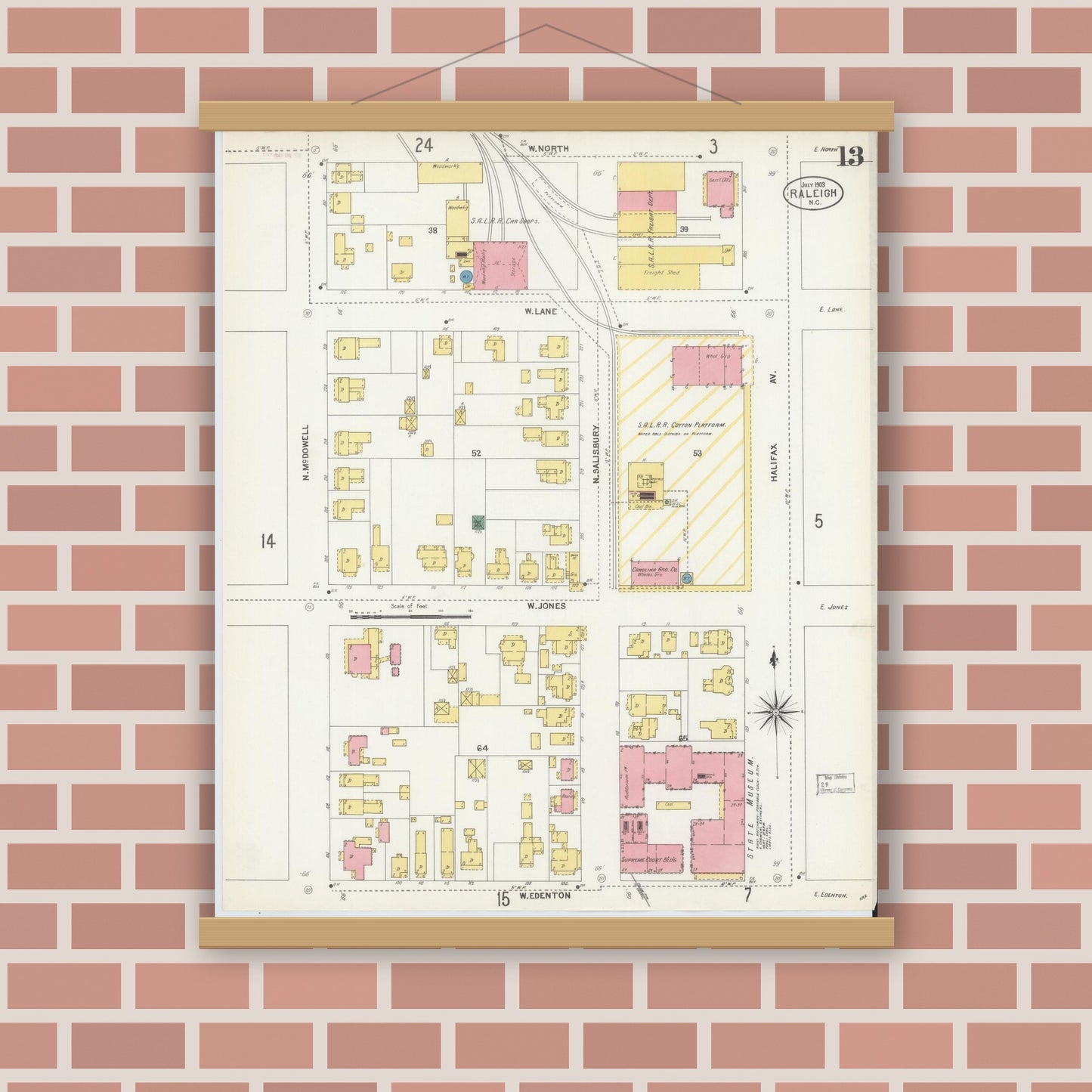 Old map wall art mockup — magnetic wood frame on brick wall — Sanborn Fire Insurance Map from Raleigh, Wake County, North Carolina (1903), Sheet #0013