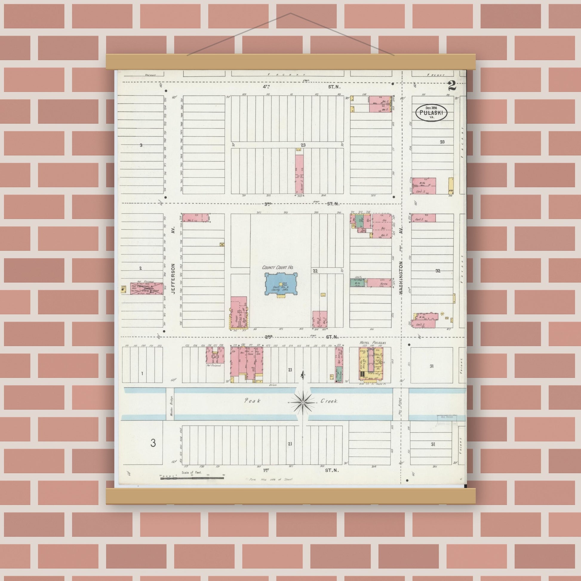 Old map wall art mockup — magnetic wood frame on brick wall — Sanborn Fire Insurance Map from Pulaski, Pulaski County, Virginia (1898), Sheet #0002