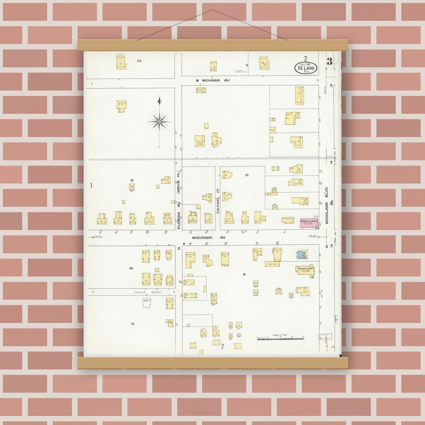 Old map wall art mockup — magnetic wood frame on brick wall — Sanborn Fire Insurance Map from De Land, Volusia County, Florida (1909), Sheet #0003