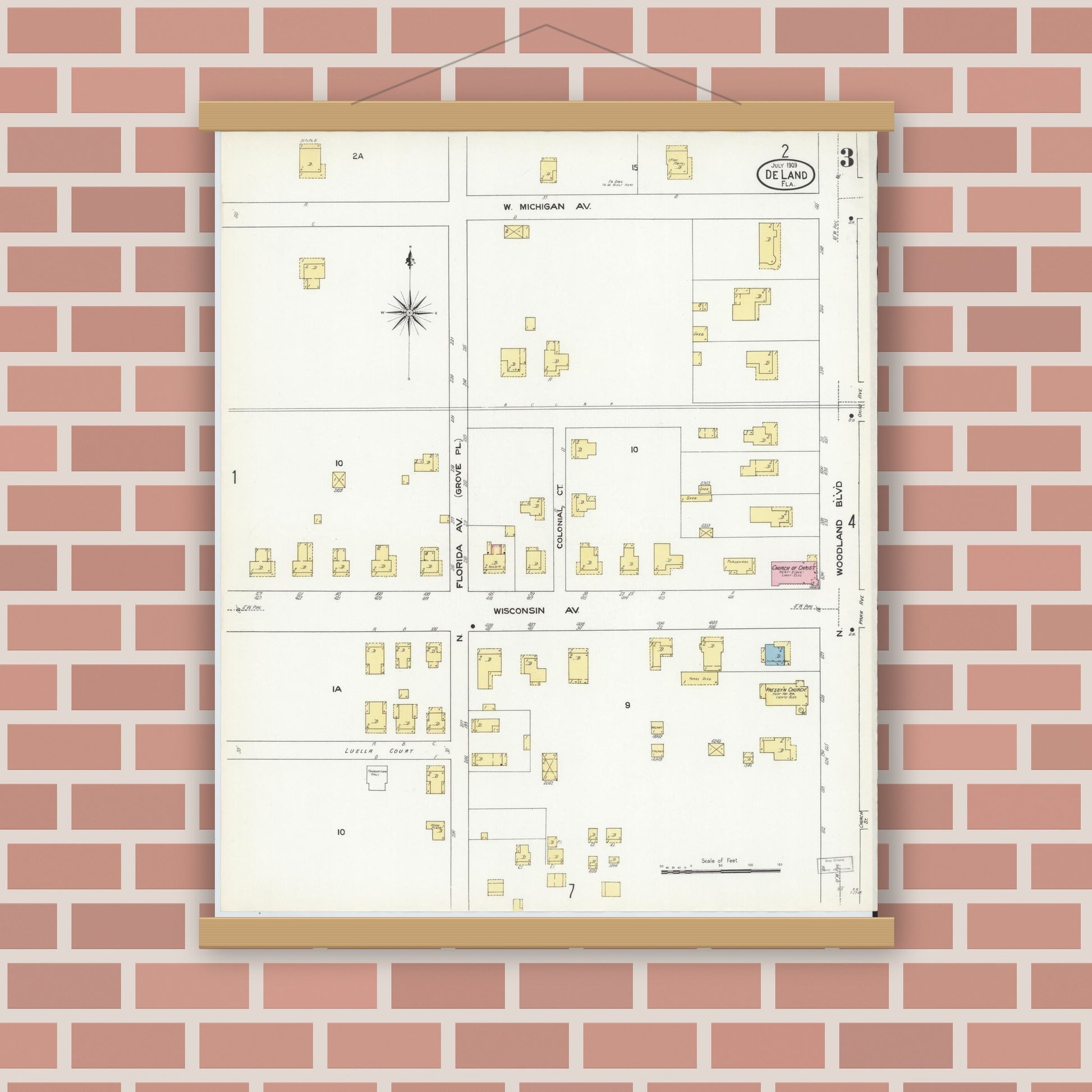 Old map wall art mockup — magnetic wood frame on brick wall — Sanborn Fire Insurance Map from De Land, Volusia County, Florida (1909), Sheet #0003