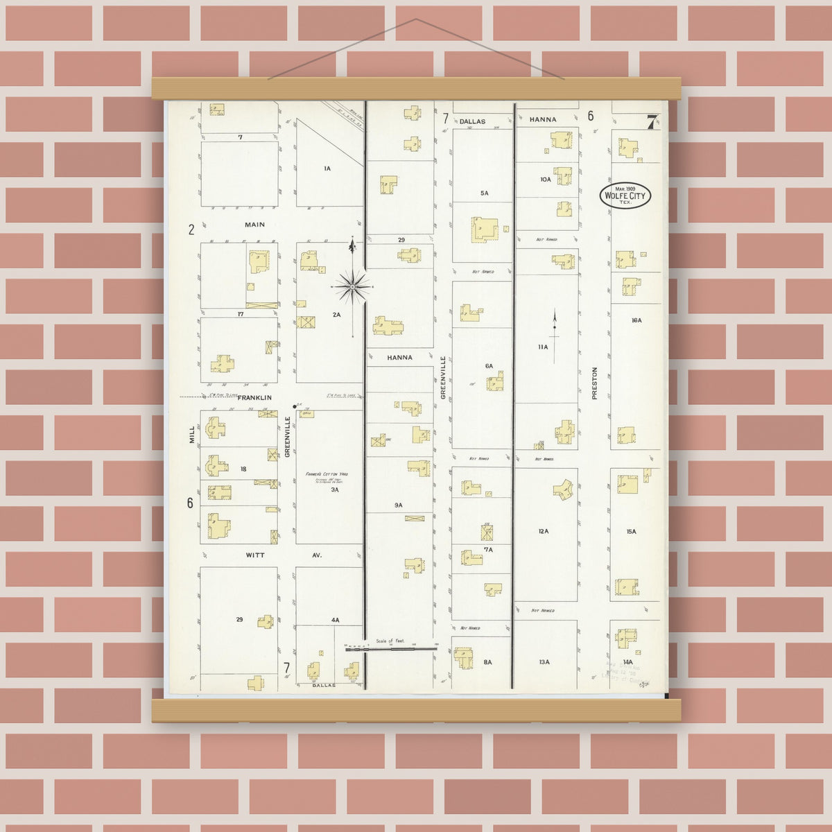 Old map wall art mockup — magnetic wood frame on brick wall — Sanborn Fire Insurance Map from Wolfe City, Hunt County, Texas (1909), Sheet #0007