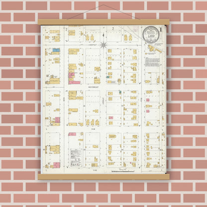 Old map wall art mockup — magnetic wood frame on brick wall — Sanborn Fire Insurance Map from Ladd, Bureau County, Illinois (1906), Sheet #0001