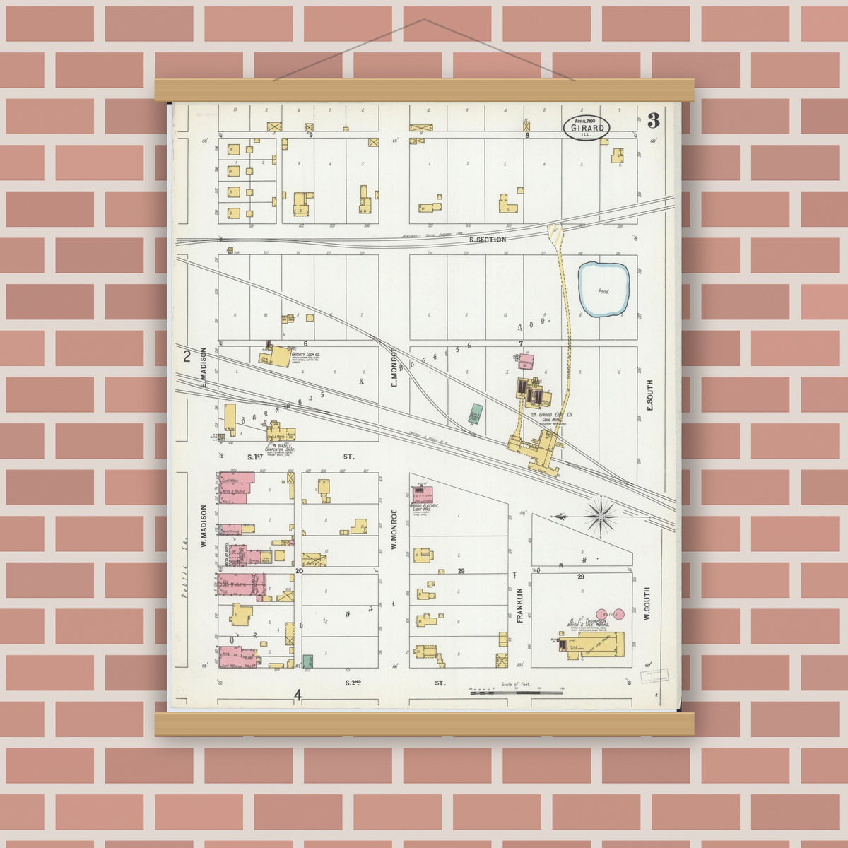 Old map wall art mockup — magnetic wood frame on brick wall — Sanborn Fire Insurance Map from Girard, Macoupin County, Illinois (1900), Sheet #0003