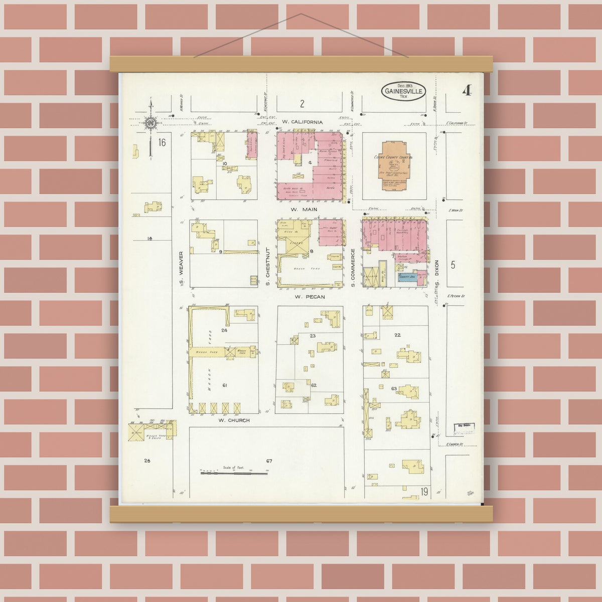 Old map wall art mockup — magnetic wood frame on brick wall — Sanborn Fire Insurance Map from Gainesville, Cooke County, Texas (1913), Sheet #0004