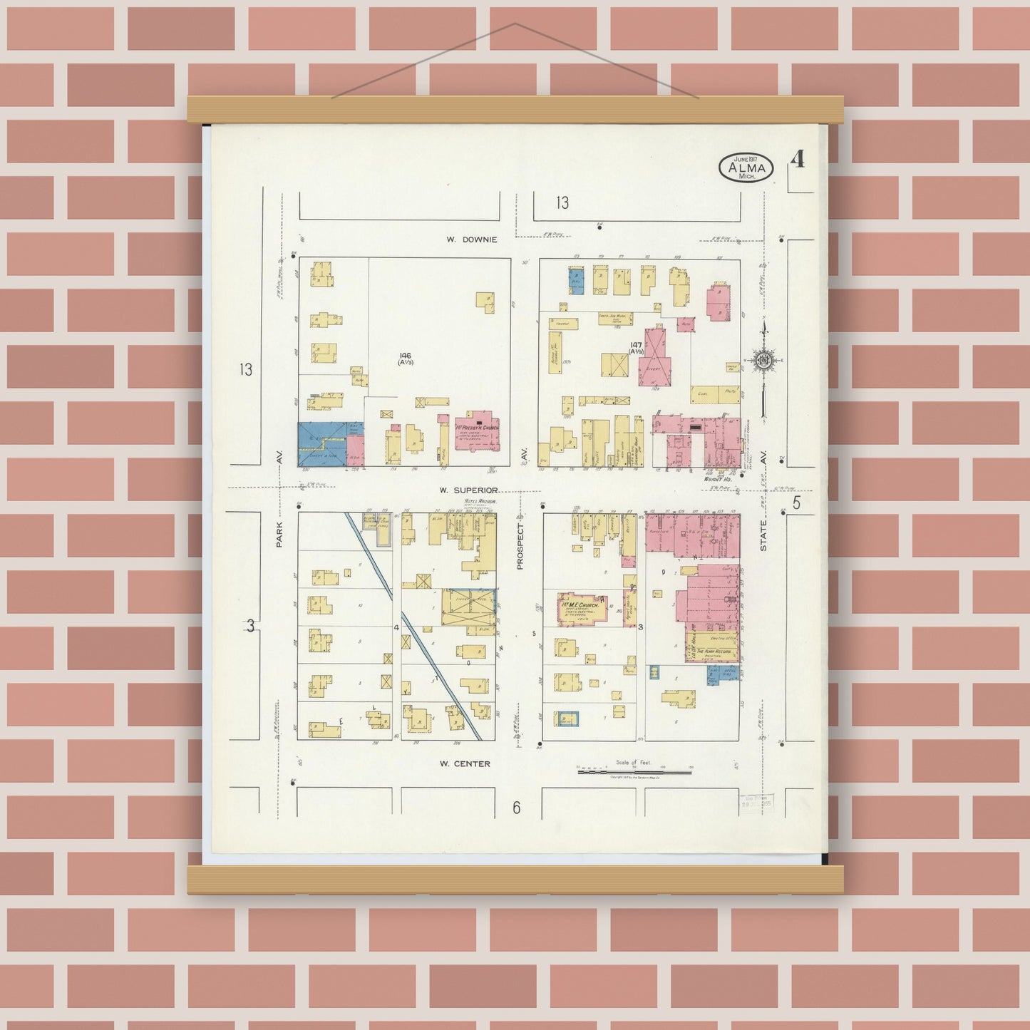 Old map wall art mockup — magnetic wood frame on brick wall — Sanborn Fire Insurance Map from Alma, Gratiot County, Michigan (1917), Sheet #0004
