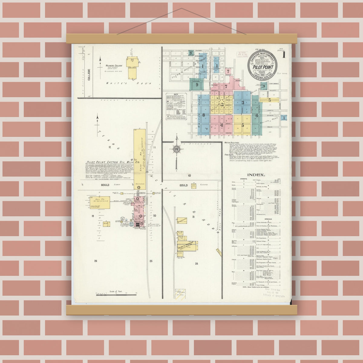 Old map wall art mockup — magnetic wood frame on brick wall — Sanborn Fire Insurance Map from Pilot Point, Denton County, Texas (1912), Sheet #0001