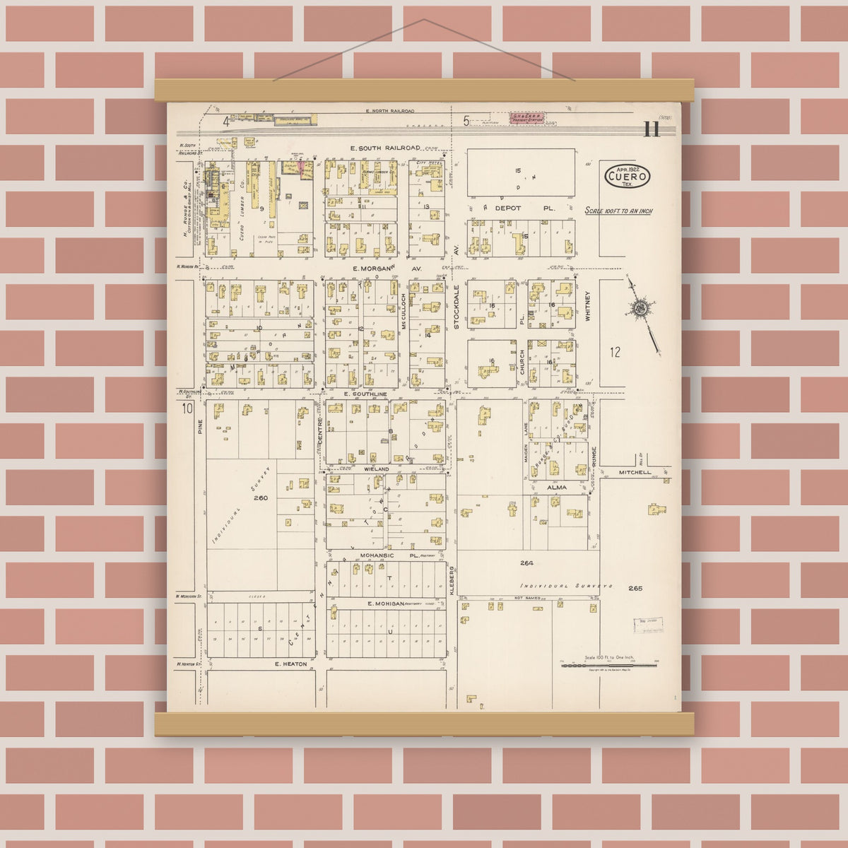 Old map wall art mockup — magnetic wood frame on brick wall — Sanborn Fire Insurance Map from Cuero, De Witt County, Texas (1922), Sheet #0011