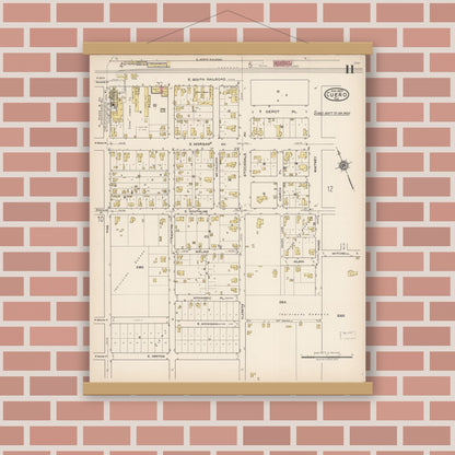 Old map wall art mockup — magnetic wood frame on brick wall — Sanborn Fire Insurance Map from Cuero, De Witt County, Texas (1922), Sheet #0011