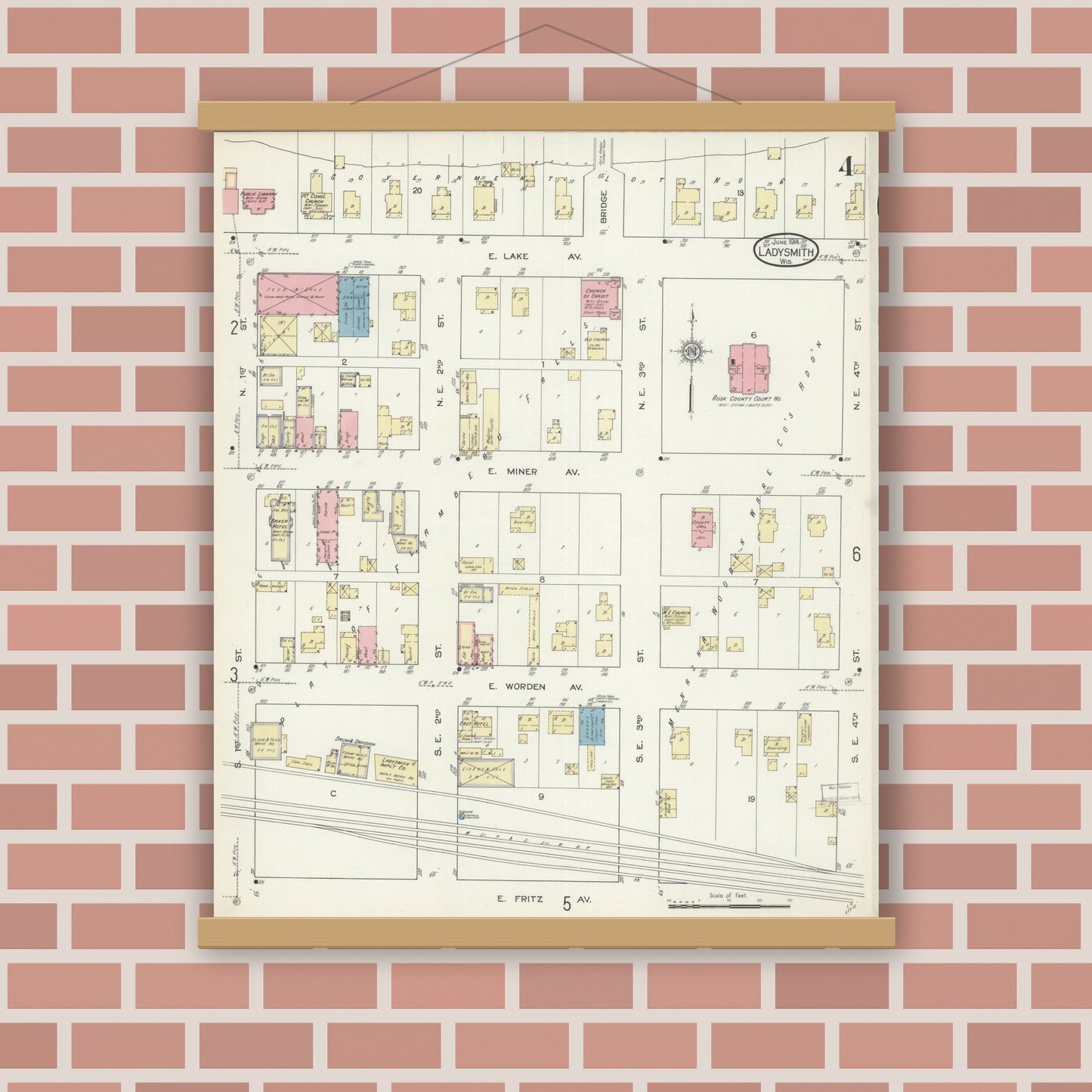 Old map wall art mockup — magnetic wood frame on brick wall — Sanborn Fire Insurance Map from Ladysmith, Rusk County, Wisconsin (1914), Sheet #0004