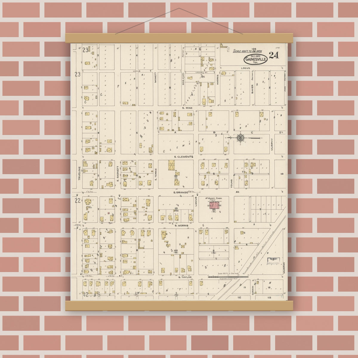 Old map wall art mockup — magnetic wood frame on brick wall — Sanborn Fire Insurance Map from Gainesville, Cooke County, Texas (1922), Sheet #0024