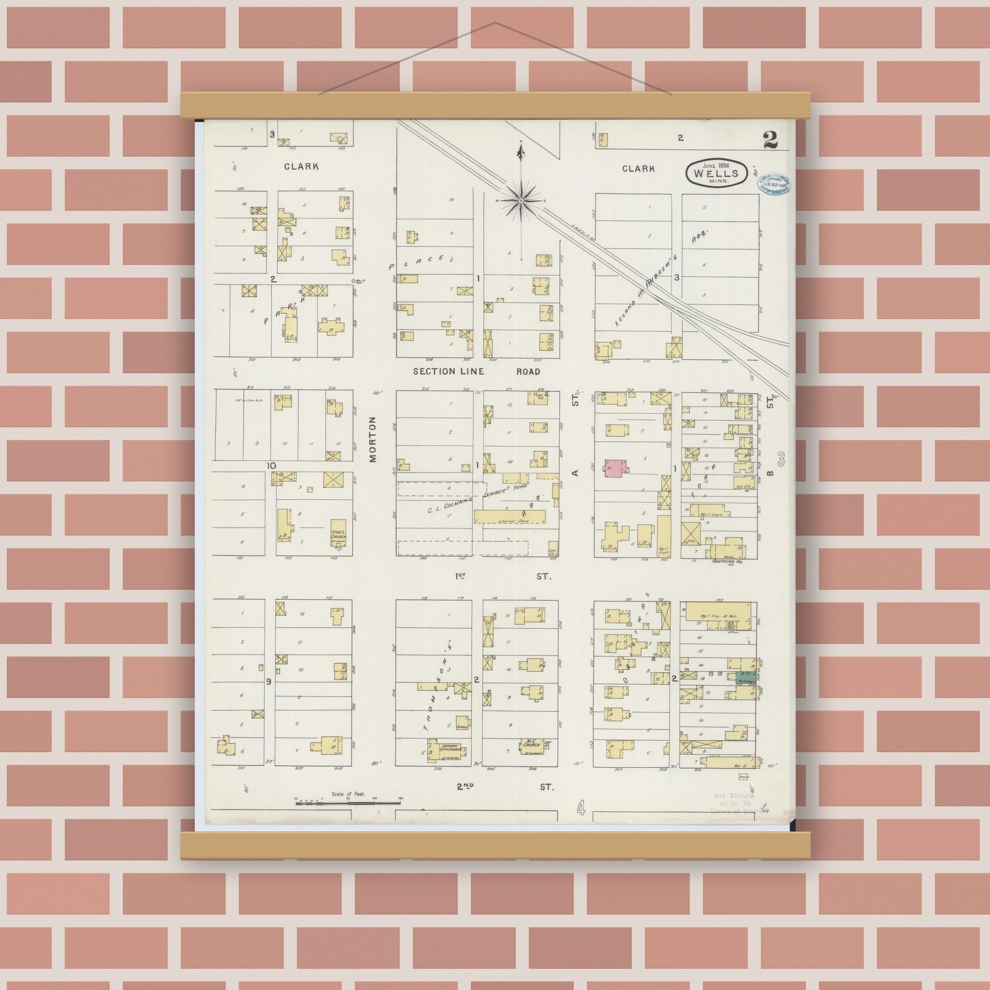 Old map wall art mockup — magnetic wood frame on brick wall — Sanborn Fire Insurance Map from Wells, Faribault County, Minnesota (1894), Sheet #0002