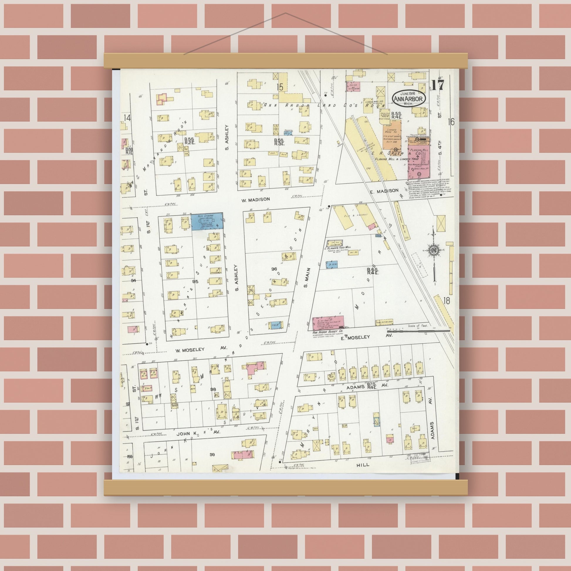 Old map wall art mockup — magnetic wood frame on brick wall — Sanborn Fire Insurance Map from Ann Arbor, Washtenaw County, Michigan (1916), Sheet #0017