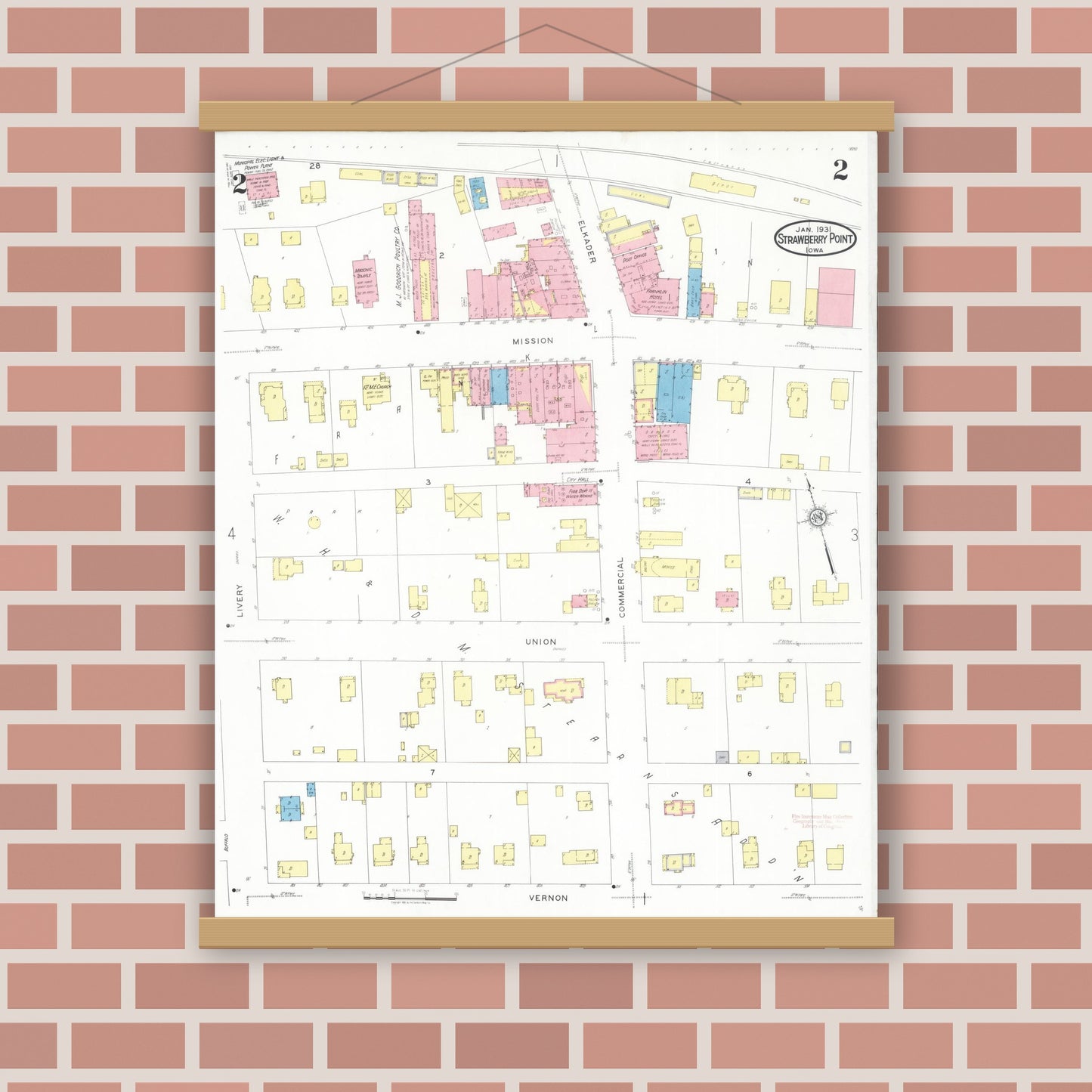 Old map wall art mockup — magnetic wood frame on brick wall — Sanborn Fire Insurance Map from Strawberry Point, Clayton County, Iowa (1931), Sheet #0002