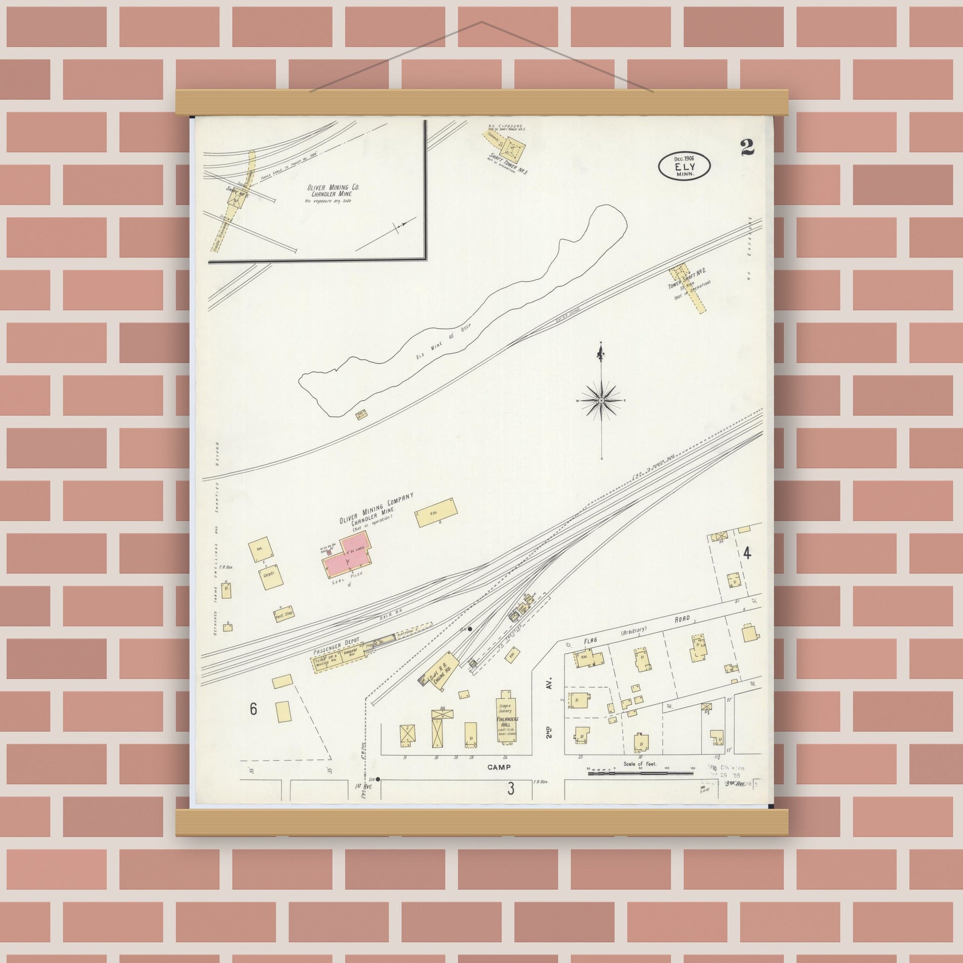 Old map wall art mockup — magnetic wood frame on brick wall — Sanborn Fire Insurance Map from Ely, Saint Louis County, Minnesota (1906), Sheet #0002