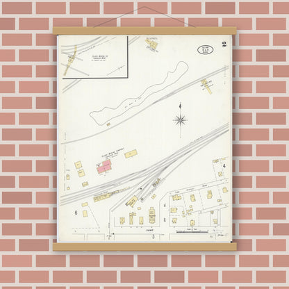 Old map wall art mockup — magnetic wood frame on brick wall — Sanborn Fire Insurance Map from Ely, Saint Louis County, Minnesota (1906), Sheet #0002