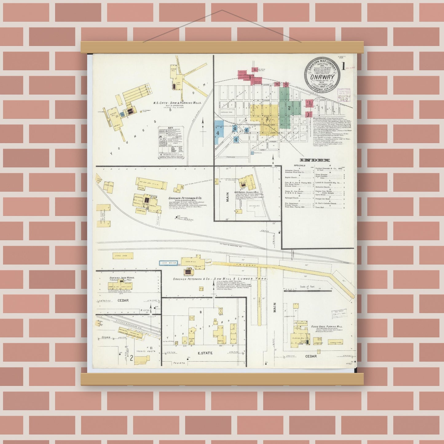 Old map wall art mockup — magnetic wood frame on brick wall — Sanborn Fire Insurance Map from Onaway, Presque Isle County, Michigan (1907) - Complete Map Set