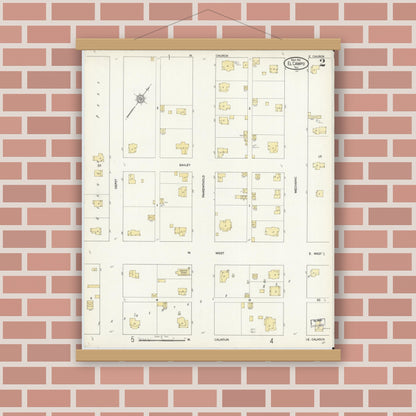 Old map wall art mockup — magnetic wood frame on brick wall — Sanborn Fire Insurance Map from El Campo, Wharton County, Texas (1912), Sheet #0002