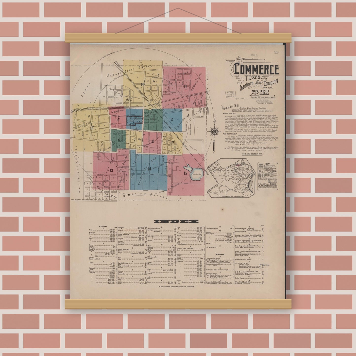 Old map wall art mockup — magnetic wood frame on brick wall — Sanborn Fire Insurance Map from Commerce, Hunt County, Texas (1922), Sheet #0001