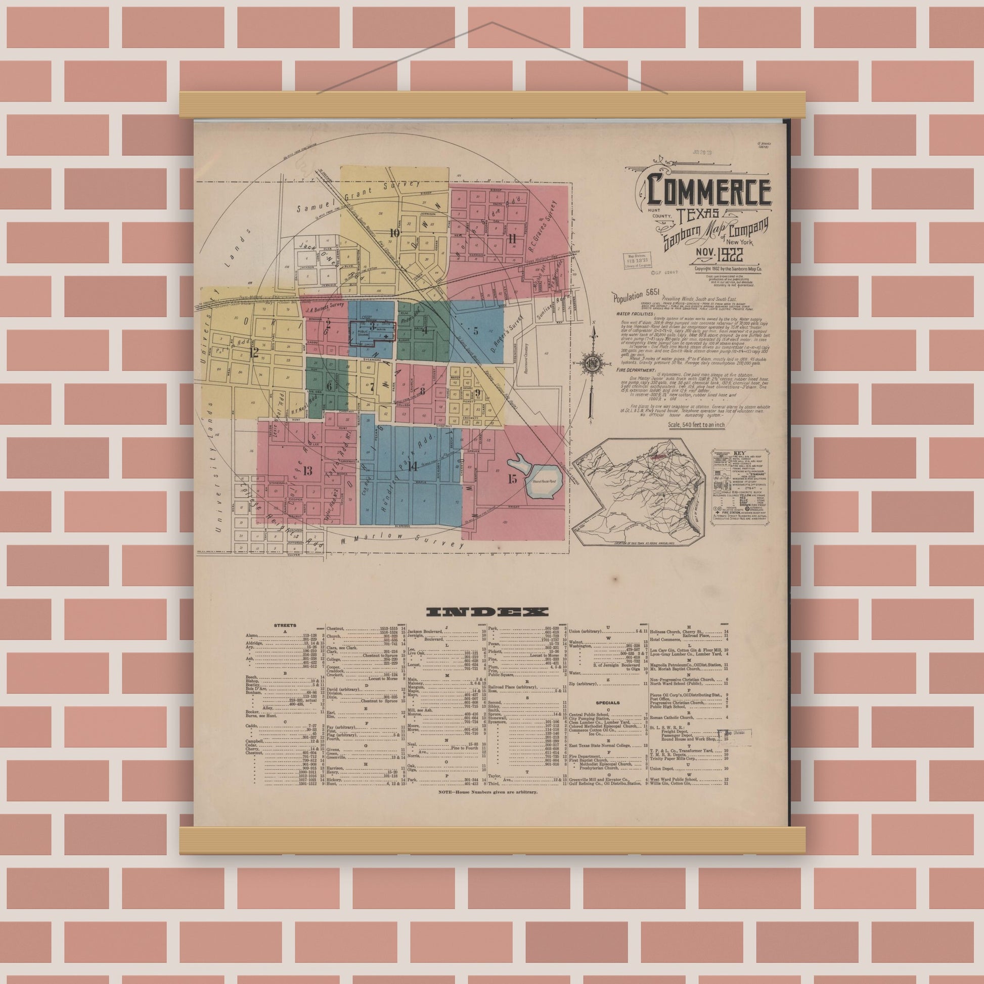 Old map wall art mockup — magnetic wood frame on brick wall — Sanborn Fire Insurance Map from Commerce, Hunt County, Texas (1922), Sheet #0001