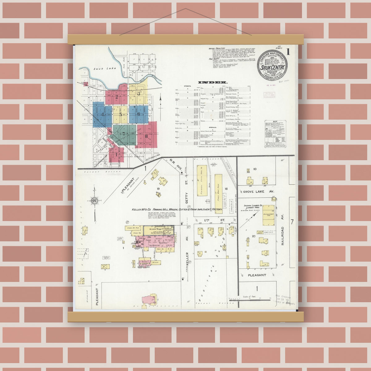 Old map wall art mockup — magnetic wood frame on brick wall — Sanborn Fire Insurance Map from Sauk Centre, Stearns County, Minnesota (1909), Sheet #0001
