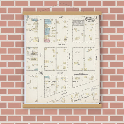 Old map wall art mockup — magnetic wood frame on brick wall — Sanborn Fire Insurance Map from River Falls, St. Croix and Pierce Counties, Wisconsin (1884), Sheet #0003