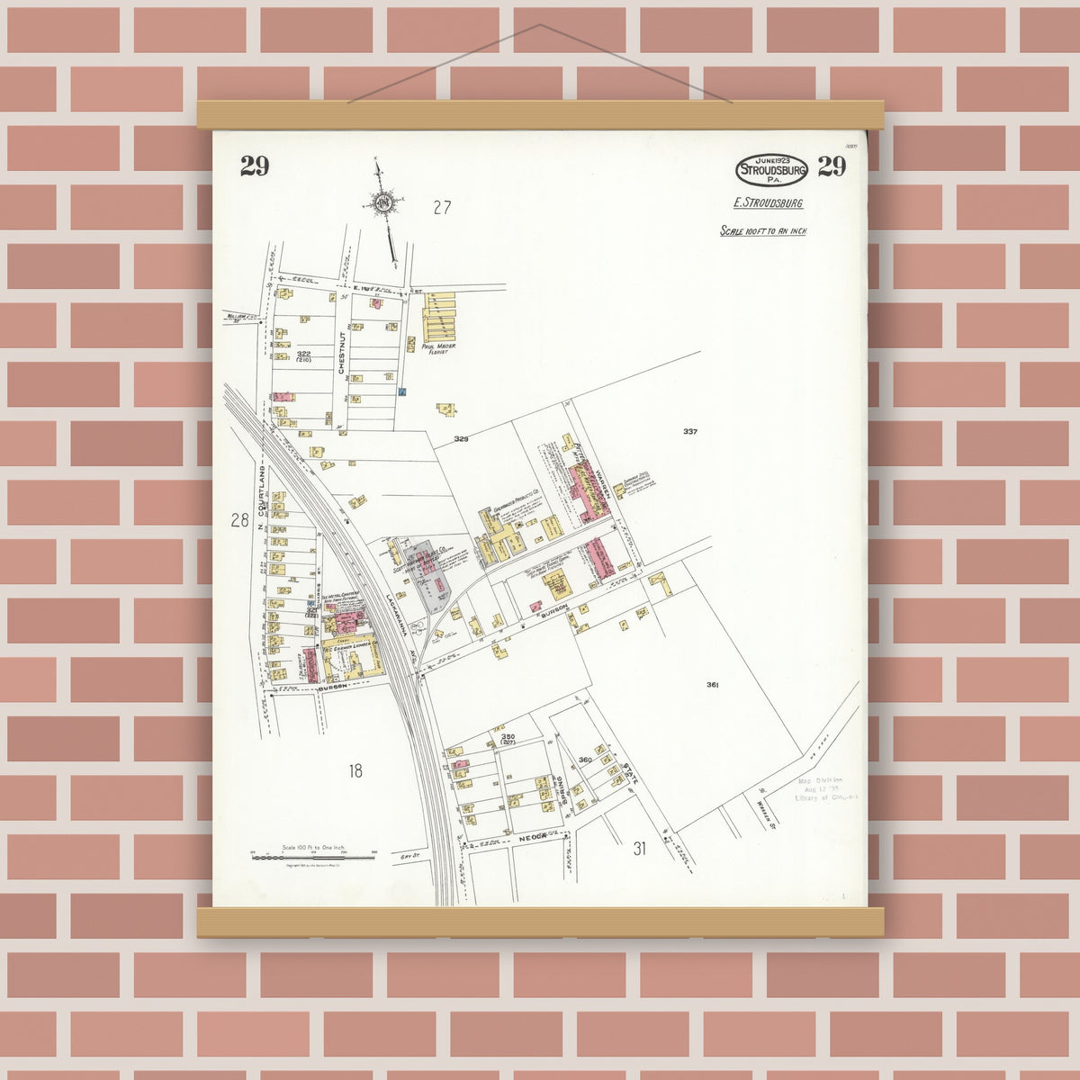 Old map wall art mockup — magnetic wood frame on brick wall — Sanborn Fire Insurance Map from Stroudsburg, Monroe County, Pennsylvania (1923), Sheet #0029