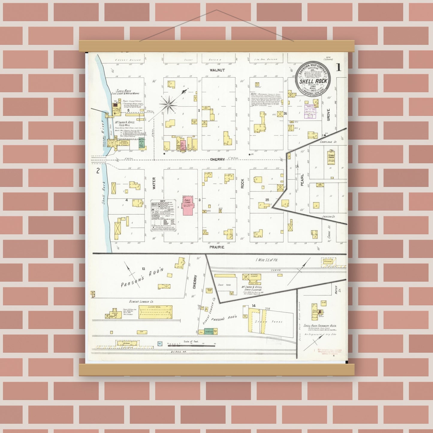 Old map wall art mockup — magnetic wood frame on brick wall — Sanborn Fire Insurance Map from Shell Rock, Butler County, Iowa (1902), Sheet #0001