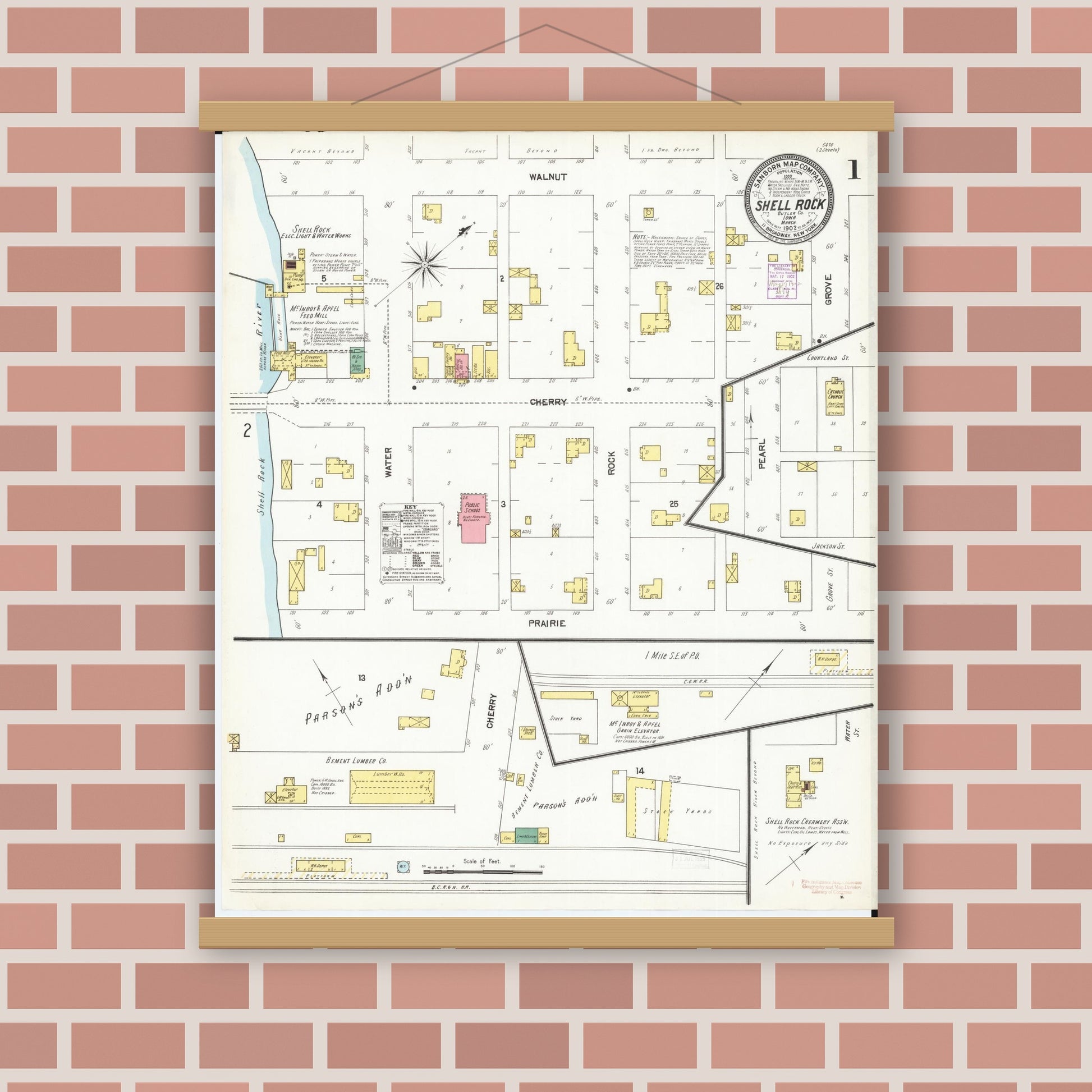 Old map wall art mockup — magnetic wood frame on brick wall — Sanborn Fire Insurance Map from Shell Rock, Butler County, Iowa (1902), Sheet #0001