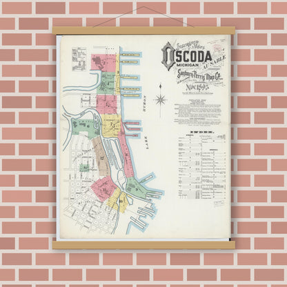 Old map wall art mockup — magnetic wood frame on brick wall — Sanborn Fire Insurance Map from Oscoda, Iosco County, Michigan (1895), Sheet #0001