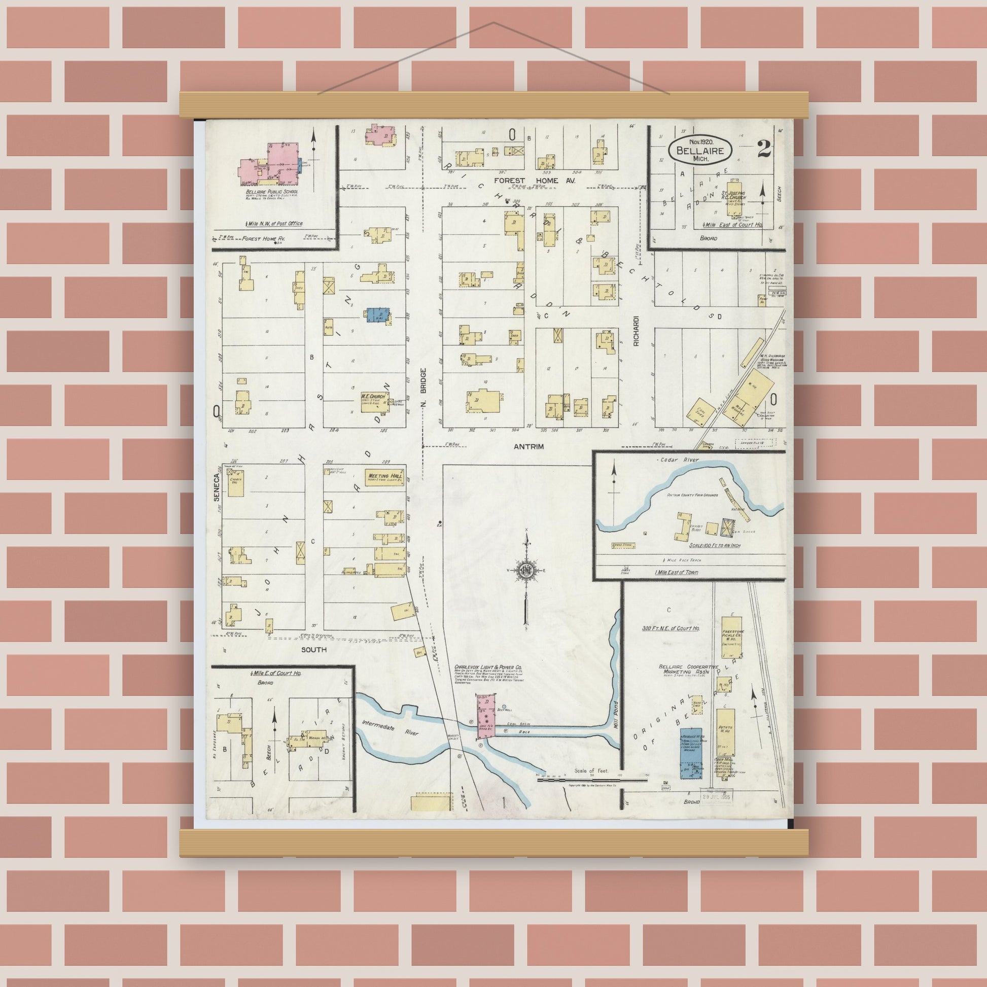 Old map wall art mockup — magnetic wood frame on brick wall — Sanborn Fire Insurance Map from Bellaire, Antrim County, Michigan (1920), Sheet #0002