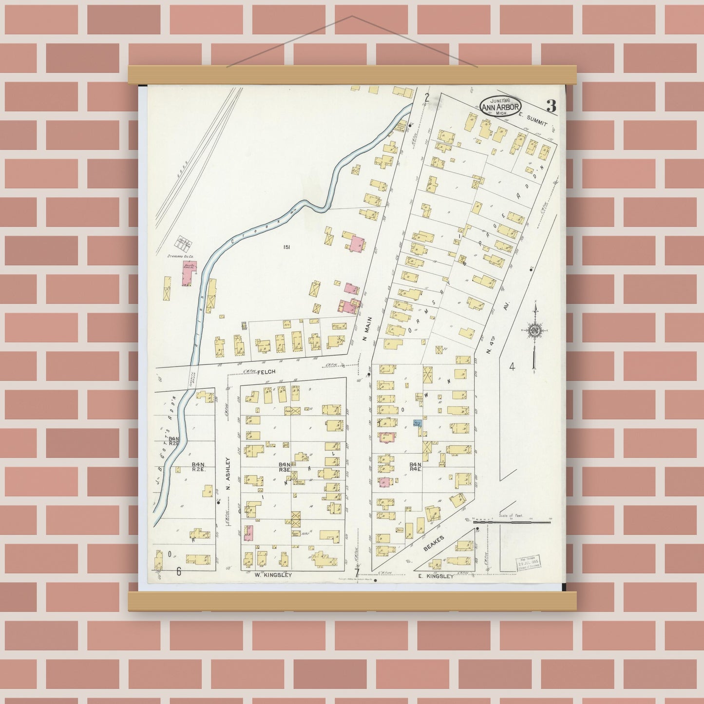 Old map wall art mockup — magnetic wood frame on brick wall — Sanborn Fire Insurance Map from Ann Arbor, Washtenaw County, Michigan (1916), Sheet #0003