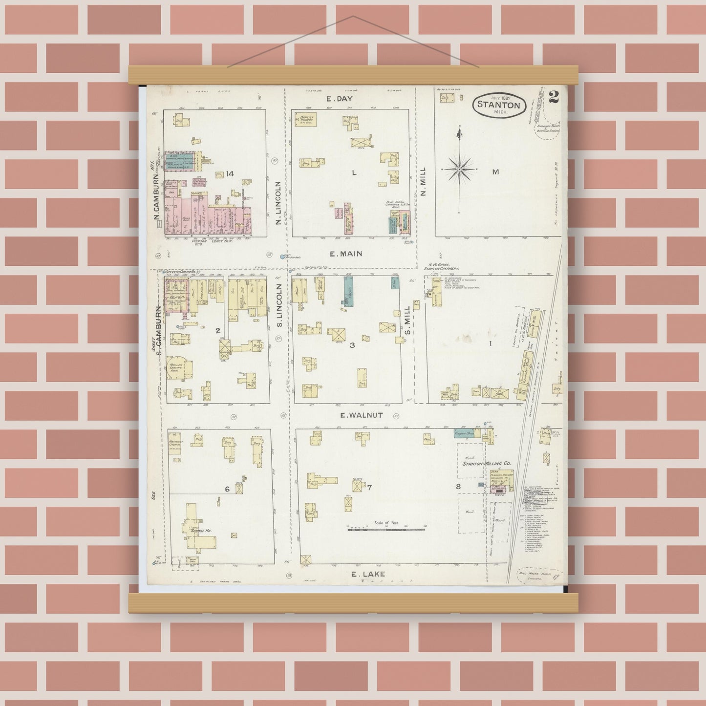 Old map wall art mockup — magnetic wood frame on brick wall — Sanborn Fire Insurance Map from Stanton, Montcalm County, Michigan (1887), Sheet #0002