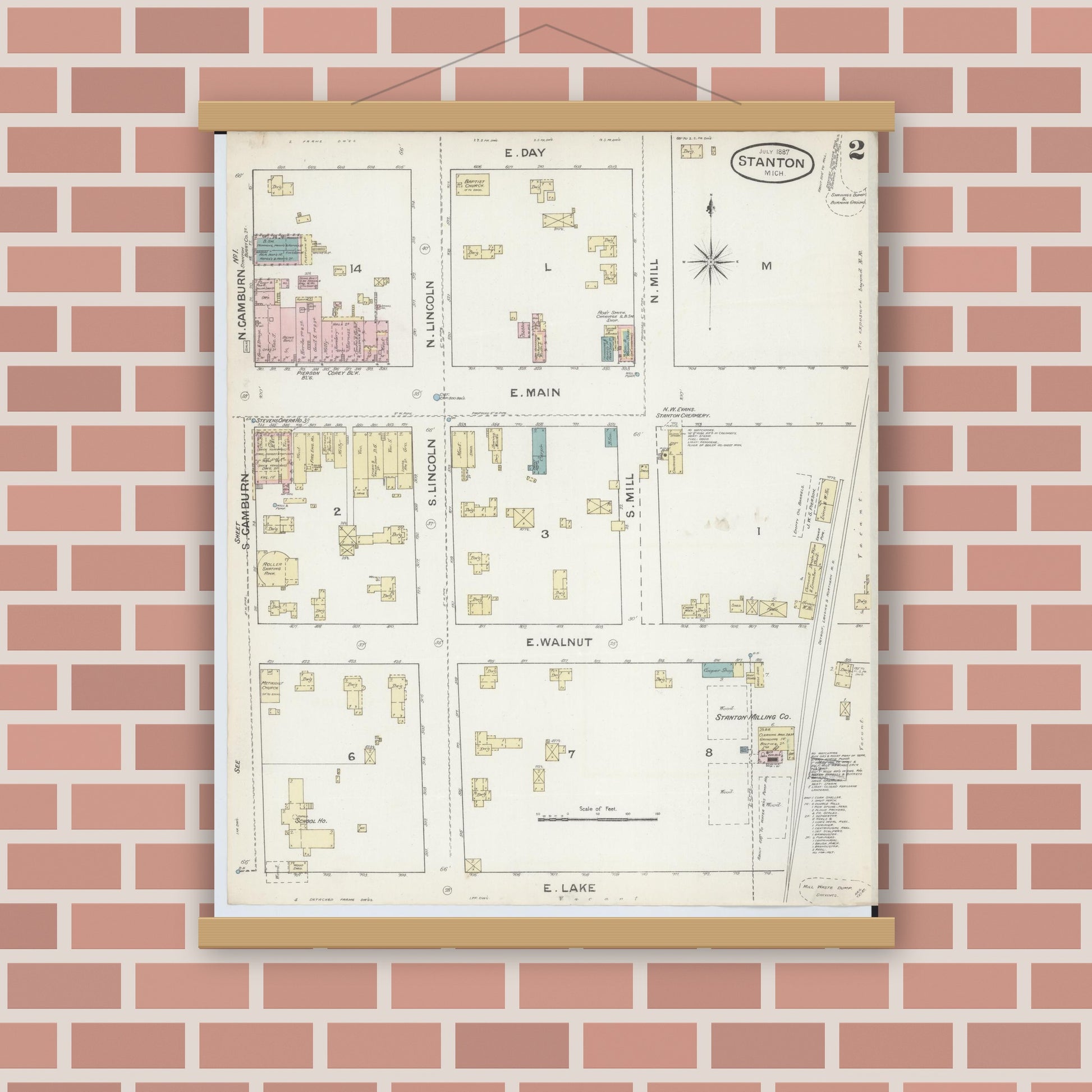 Old map wall art mockup — magnetic wood frame on brick wall — Sanborn Fire Insurance Map from Stanton, Montcalm County, Michigan (1887), Sheet #0002
