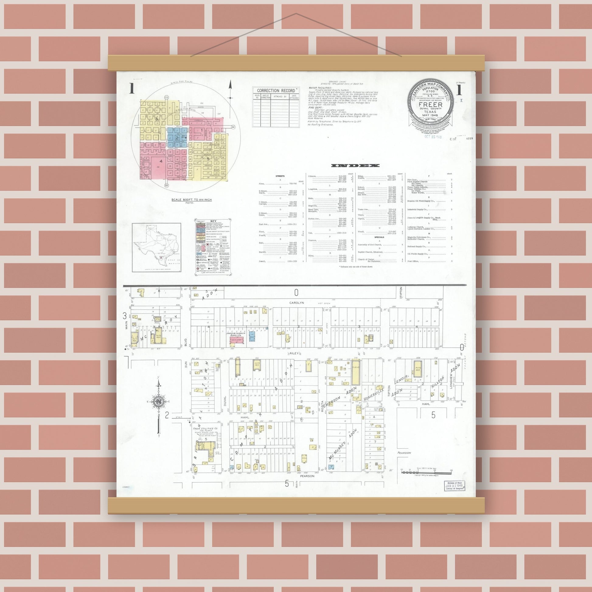 Old map wall art mockup — magnetic wood frame on brick wall — Sanborn Fire Insurance Map from Freer, Duval County, Texas (1948) - Complete Map Set