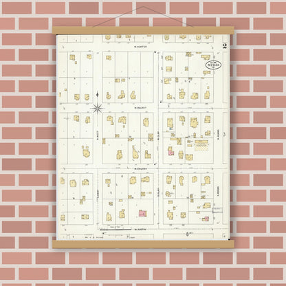 Old map wall art mockup — magnetic wood frame on brick wall — Sanborn Fire Insurance Map from Nevada, Vernon County, Missouri (1906), Sheet #0002