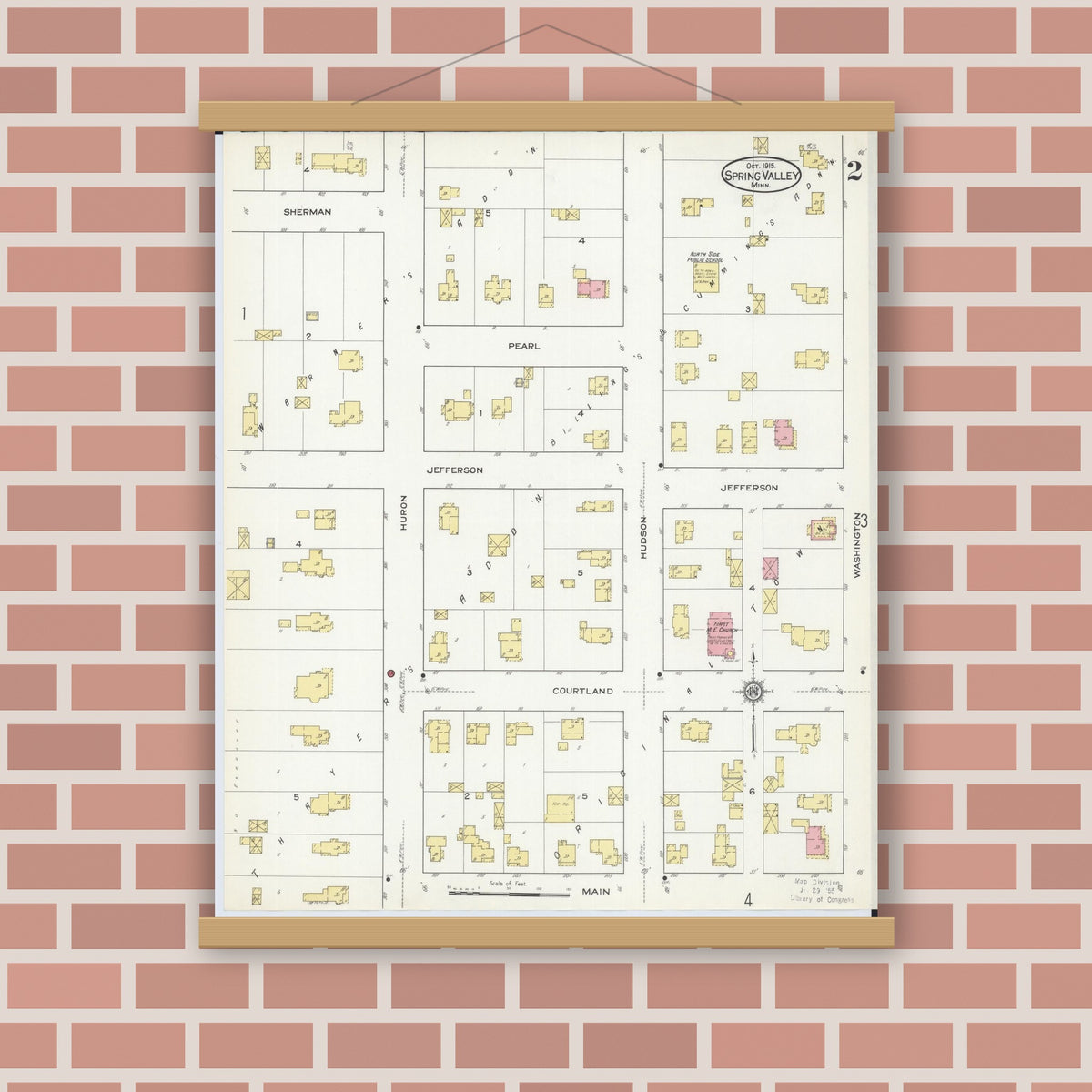 Old map wall art mockup — magnetic wood frame on brick wall — Sanborn Fire Insurance Map from Spring Valley, Fillmore County, Minnesota (1915), Sheet #0002