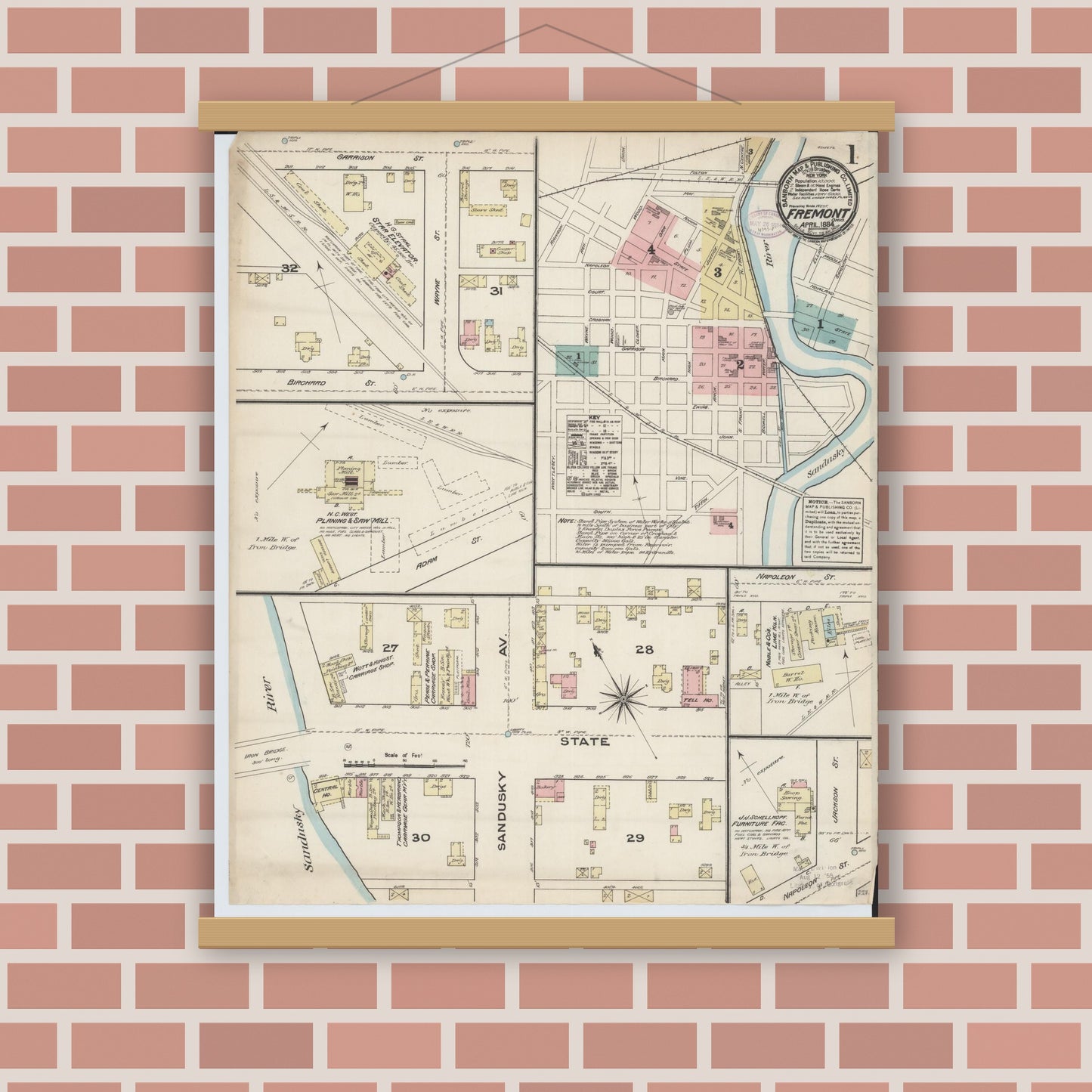 Old map wall art mockup — magnetic wood frame on brick wall — Sanborn Fire Insurance Map from Fremont, Sandusky County, Ohio (1884), Sheet #0001