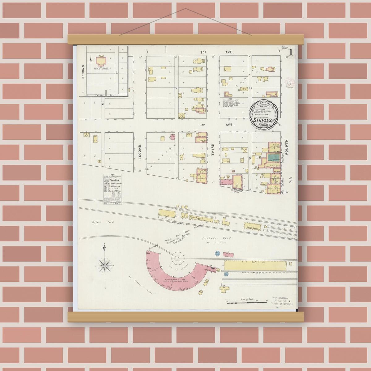 Old map wall art mockup — magnetic wood frame on brick wall — Sanborn Fire Insurance Map from Staples, Todd County, Minnesota (1894), Sheet #0001