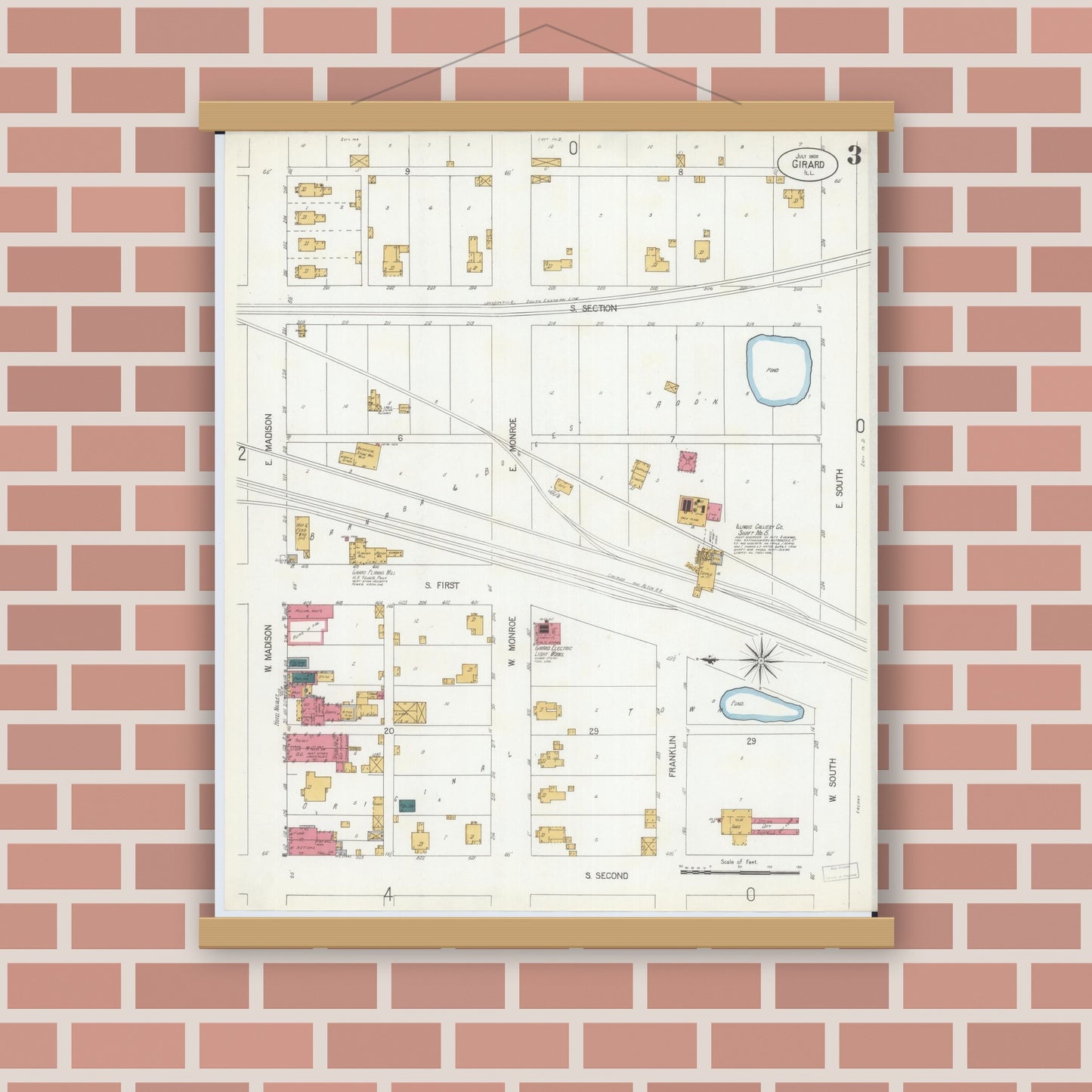 Old map wall art mockup — magnetic wood frame on brick wall — Sanborn Fire Insurance Map from Girard, Macoupin County, Illinois (1906), Sheet #0003