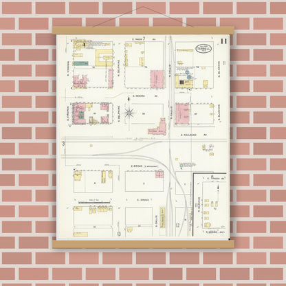 Old map wall art mockup — magnetic wood frame on brick wall — Sanborn Fire Insurance Map from Terrell, Kaufman County, Texas (1909), Sheet #0011