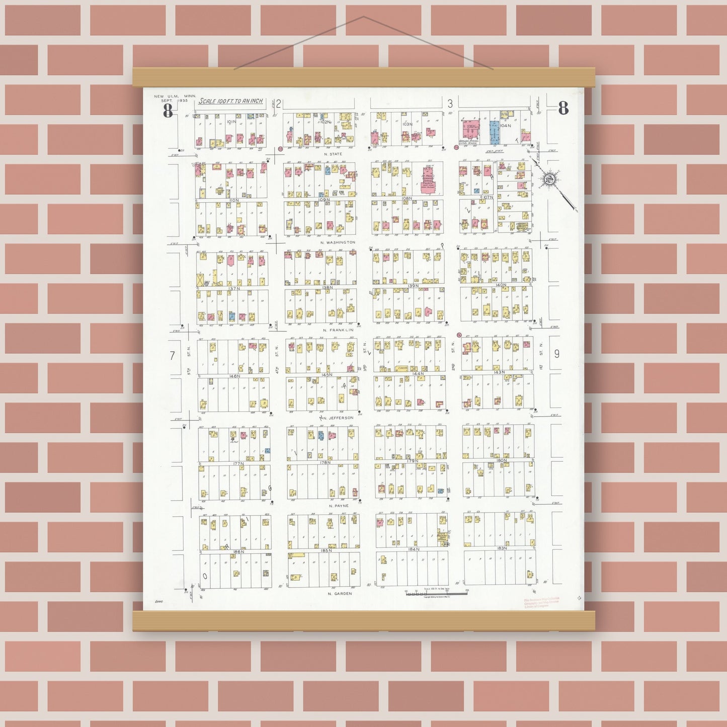 Old map wall art mockup — magnetic wood frame on brick wall — Sanborn Fire Insurance Map from New Ulm, Brown County, Minnesota (1935), Sheet #0008