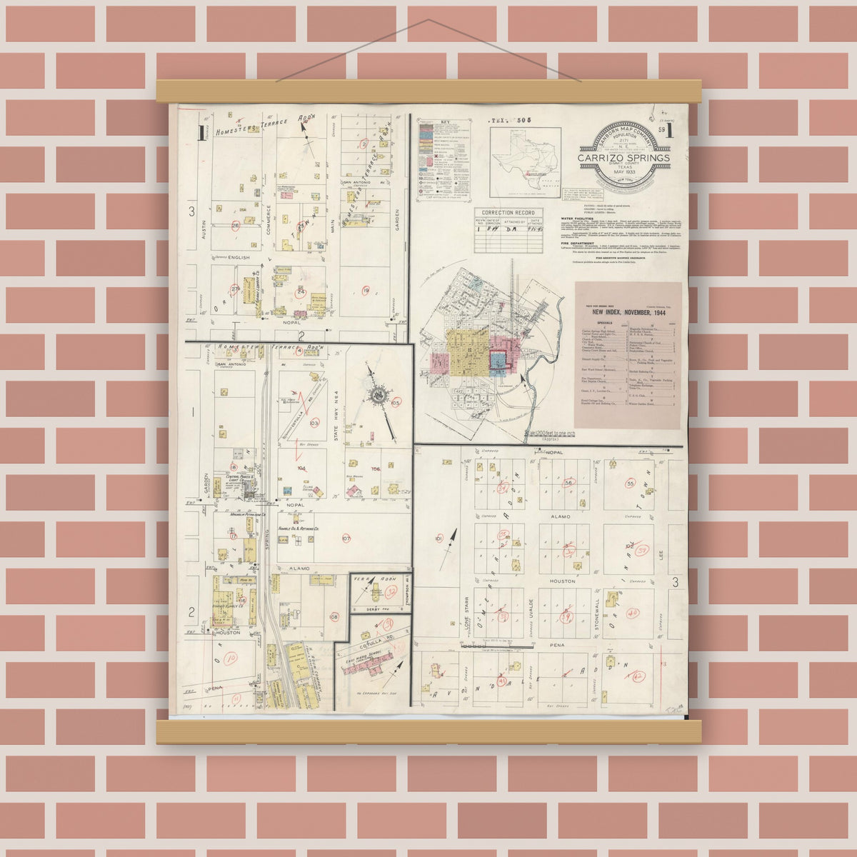 Old map wall art mockup — magnetic wood frame on brick wall — Sanborn Fire Insurance Map from Carrizo Springs, Dimmit County, Texas (1944) - Complete Map Set