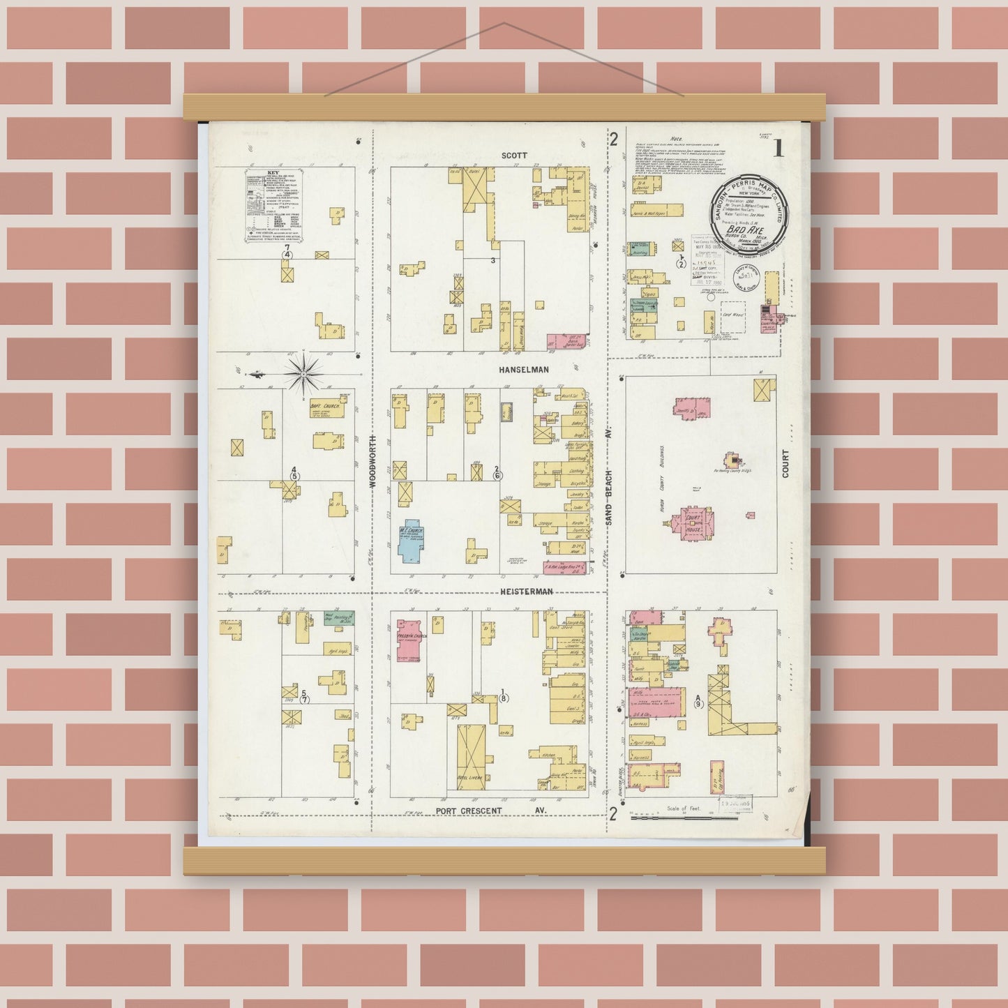 Old map wall art mockup — magnetic wood frame on brick wall — Sanborn Fire Insurance Map from Bad Axe, Huron County, Michigan (1900), Sheet #0001