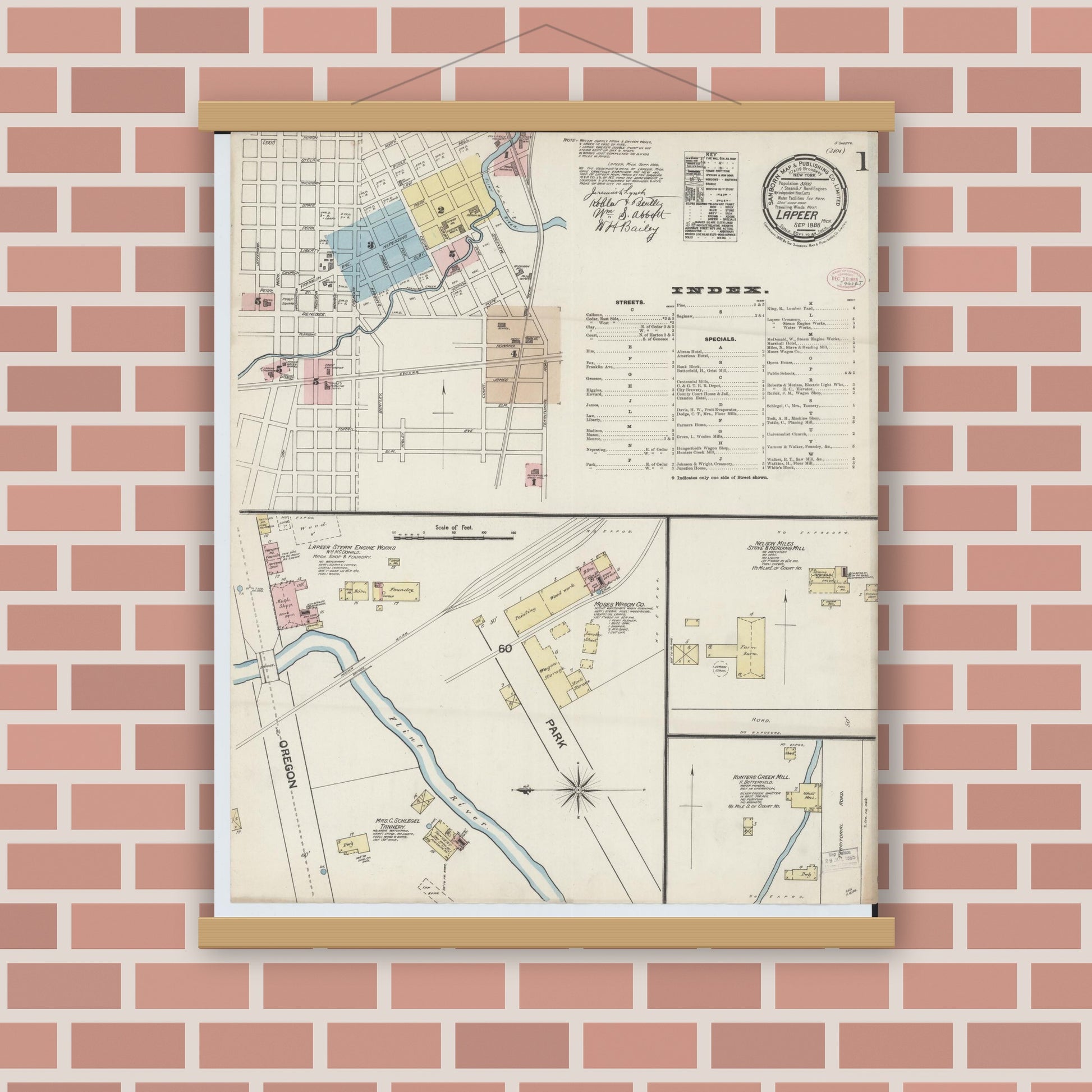 Old map wall art mockup — magnetic wood frame on brick wall — Sanborn Fire Insurance Map from Lapeer, Lapeer County, Michigan (1888) - Complete Map Set