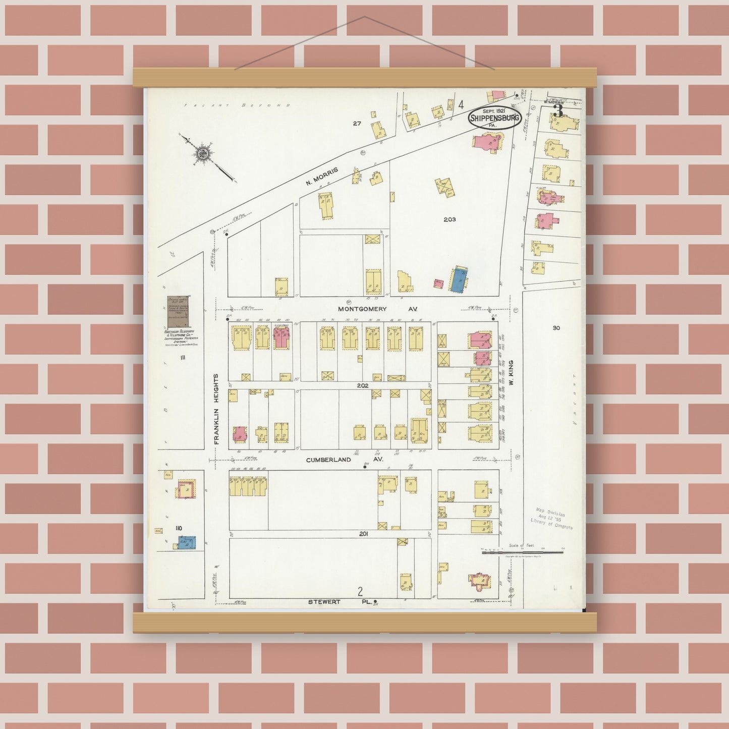 Old map wall art mockup — magnetic wood frame on brick wall — Sanborn Fire Insurance Map from Shippensburg, Cumberland And Franklin Counties, Pennsylvania (1921), Sheet #0003