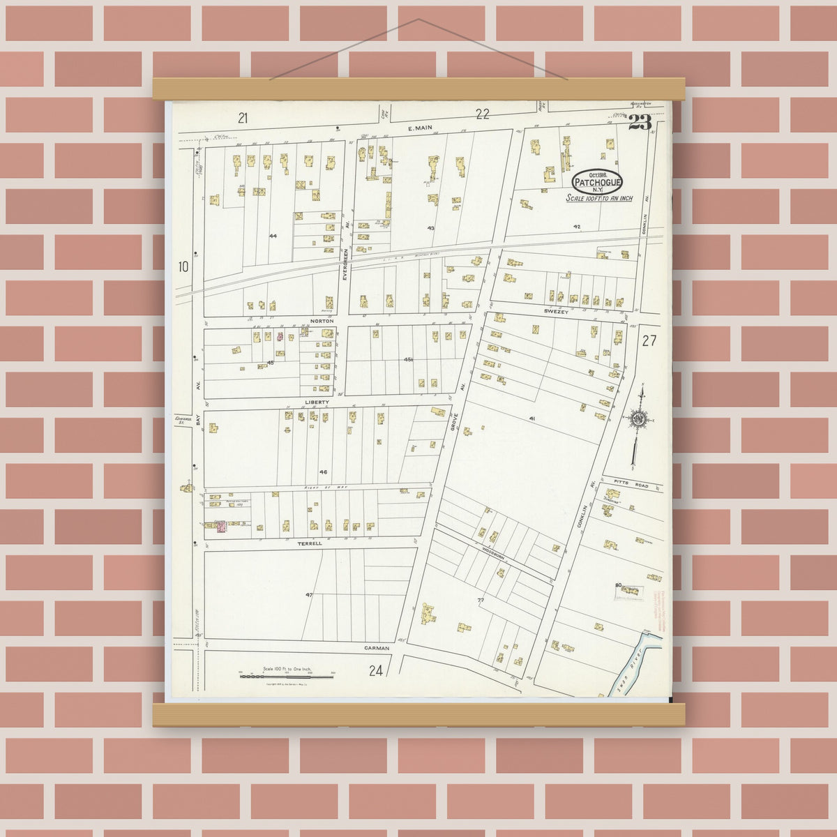 Old map wall art mockup — magnetic wood frame on brick wall — Sanborn Fire Insurance Map from Patchogue, Suffolk County, New York (1916), Sheet #0023