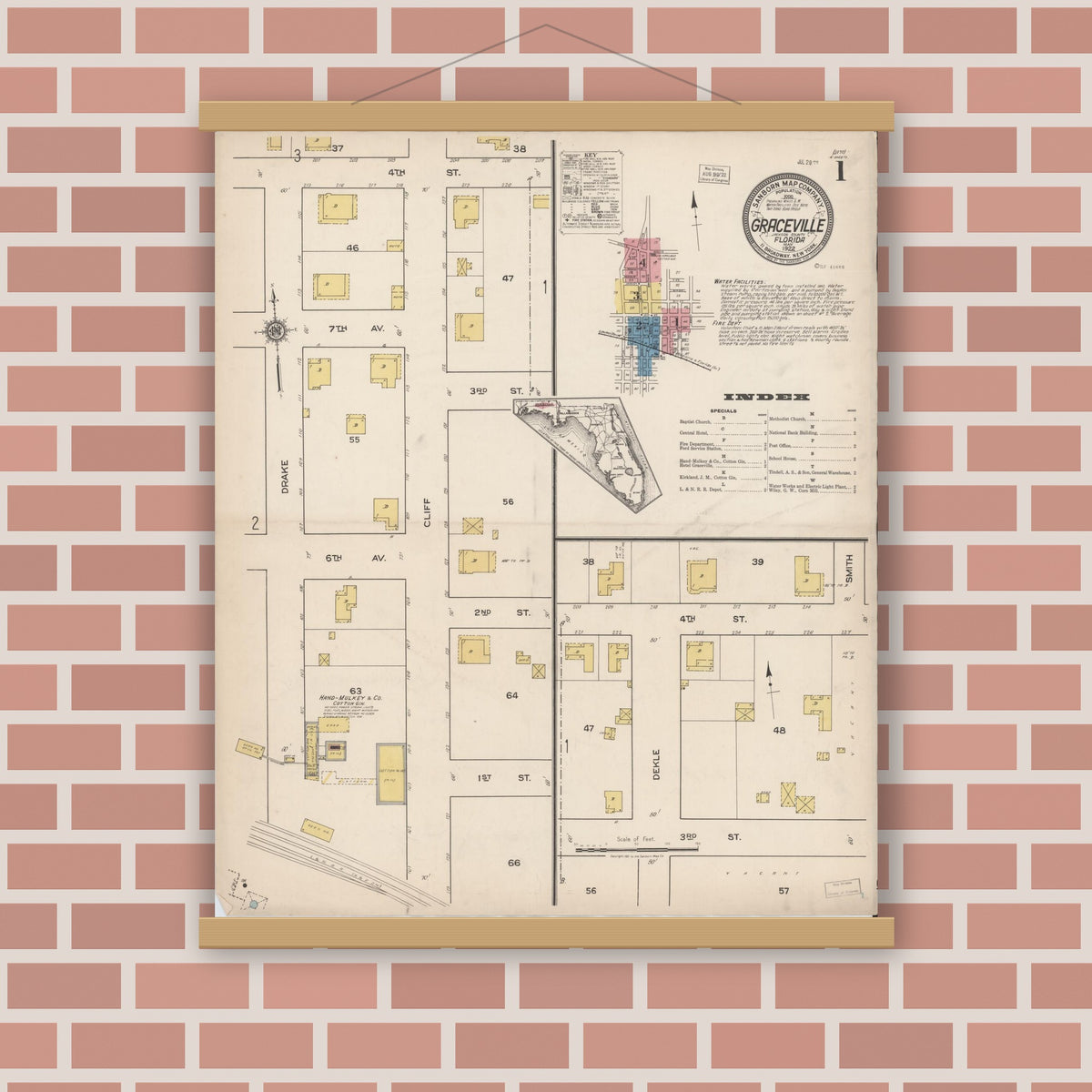 Old map wall art mockup — magnetic wood frame on brick wall — Sanborn Fire Insurance Map from Graceville, Jackson County, Florida (1922) - Complete Map Set