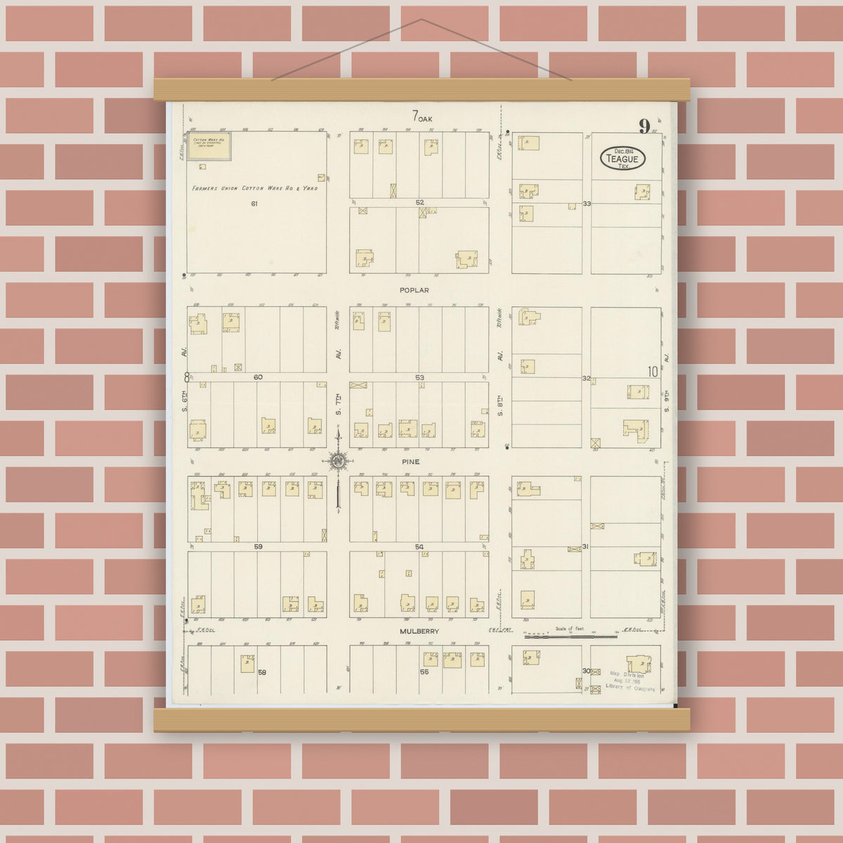 Old map wall art mockup — magnetic wood frame on brick wall — Sanborn Fire Insurance Map from Teague, Freestone County, Texas (1914), Sheet #0009
