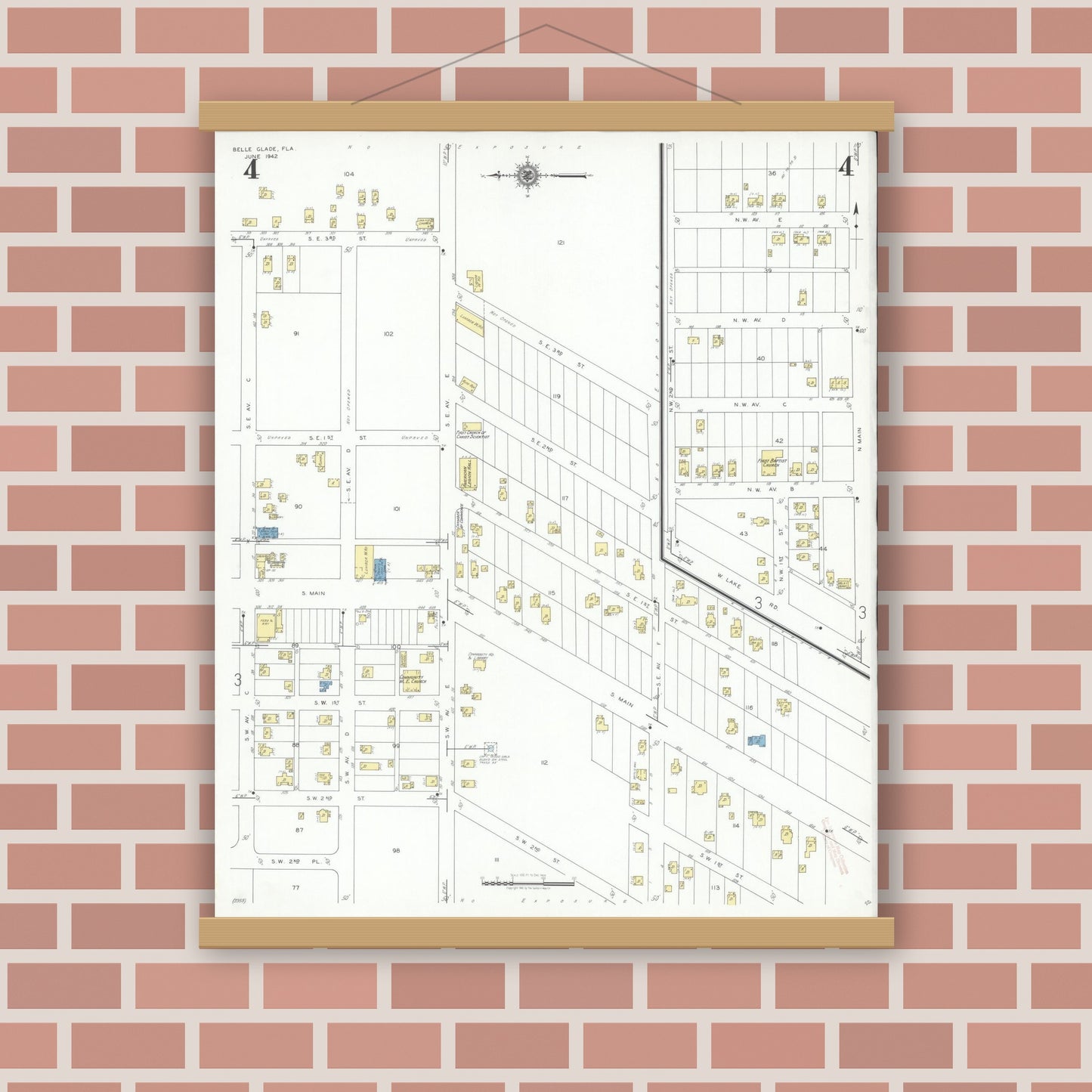 Old map wall art mockup — magnetic wood frame on brick wall — Sanborn Fire Insurance Map from Belle Glade, Palm Beach County, Florida (1942), Sheet #0004