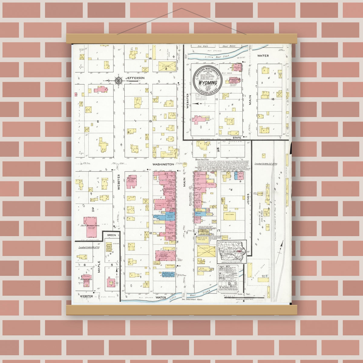 Old map wall art mockup — magnetic wood frame on brick wall — Sanborn Fire Insurance Map from Wyoming, Jones County, Iowa (1917), Sheet #0001